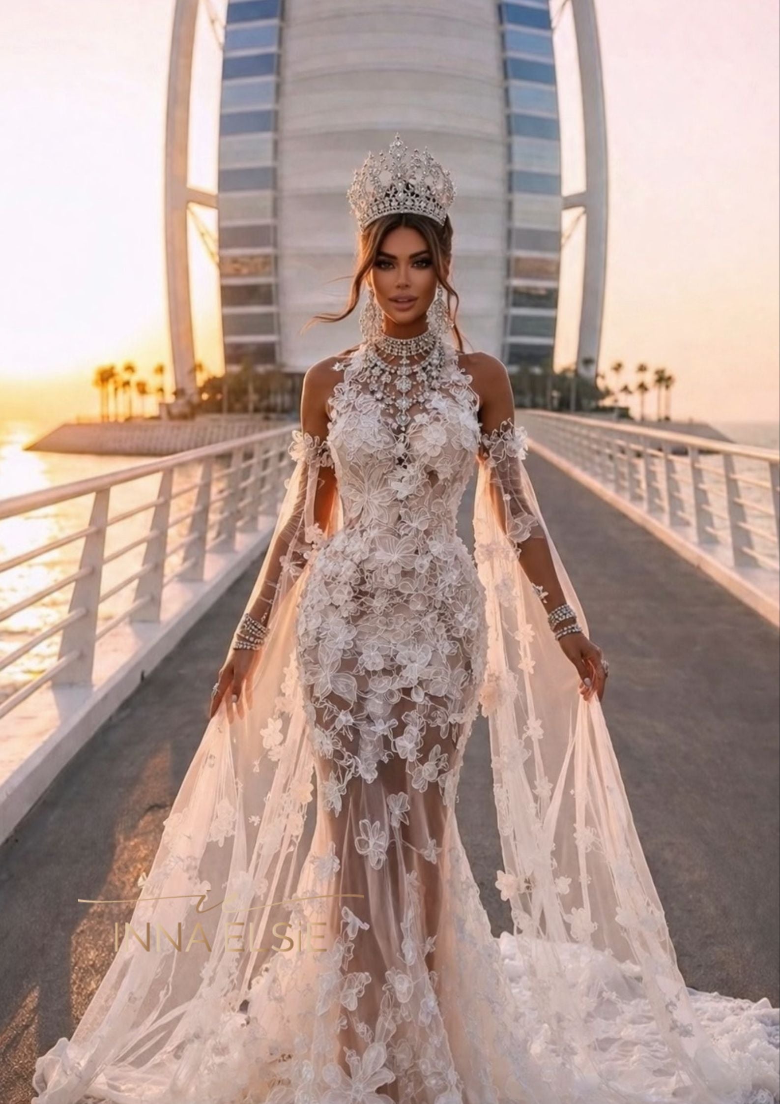 Klarissa Sheer Floral Appliqué Gown With High Neck & Detachable Sleeve Klarissa Sheer Floral Appliqué Gown With High Neck & Detachable Sleeve
