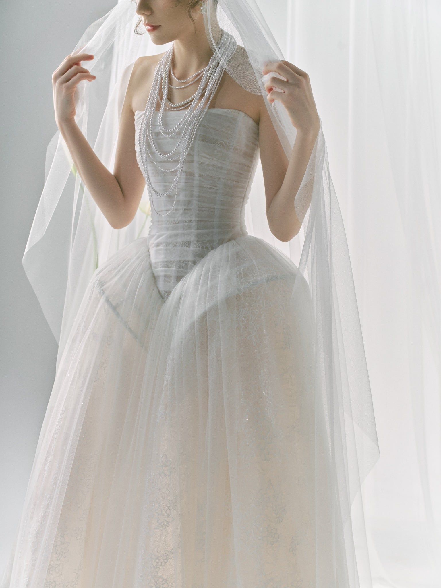 ASTERIA Strapless Draped Tulle Ball Gown With Pearl Detailing