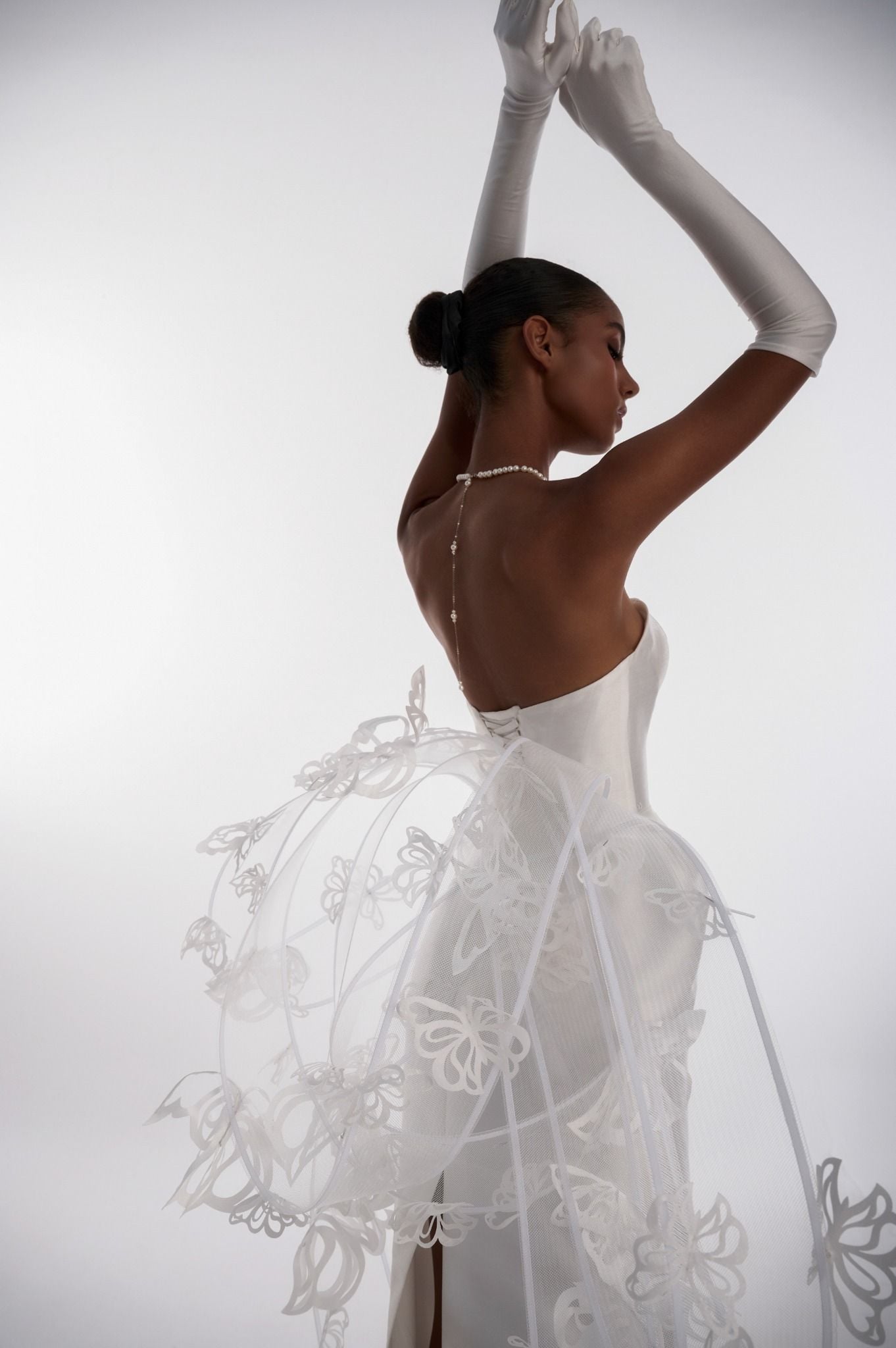 PAOLA Strapless Column Gown With Sculptural Butterfly Overskirt
